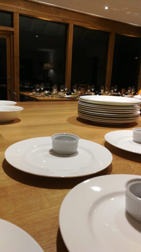 Image of plates and table decorated for dinner